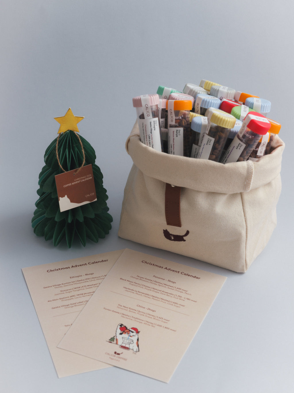 Calico Christmas Calendar bag and coffee tubes with festive styling