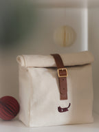 Calico Christmas Calendar canvas bag on a shelf